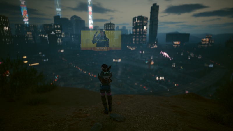 V, overlooking Night City at twilight. In the distance, a virtual billboard advertises that I have played the game for 800 hours