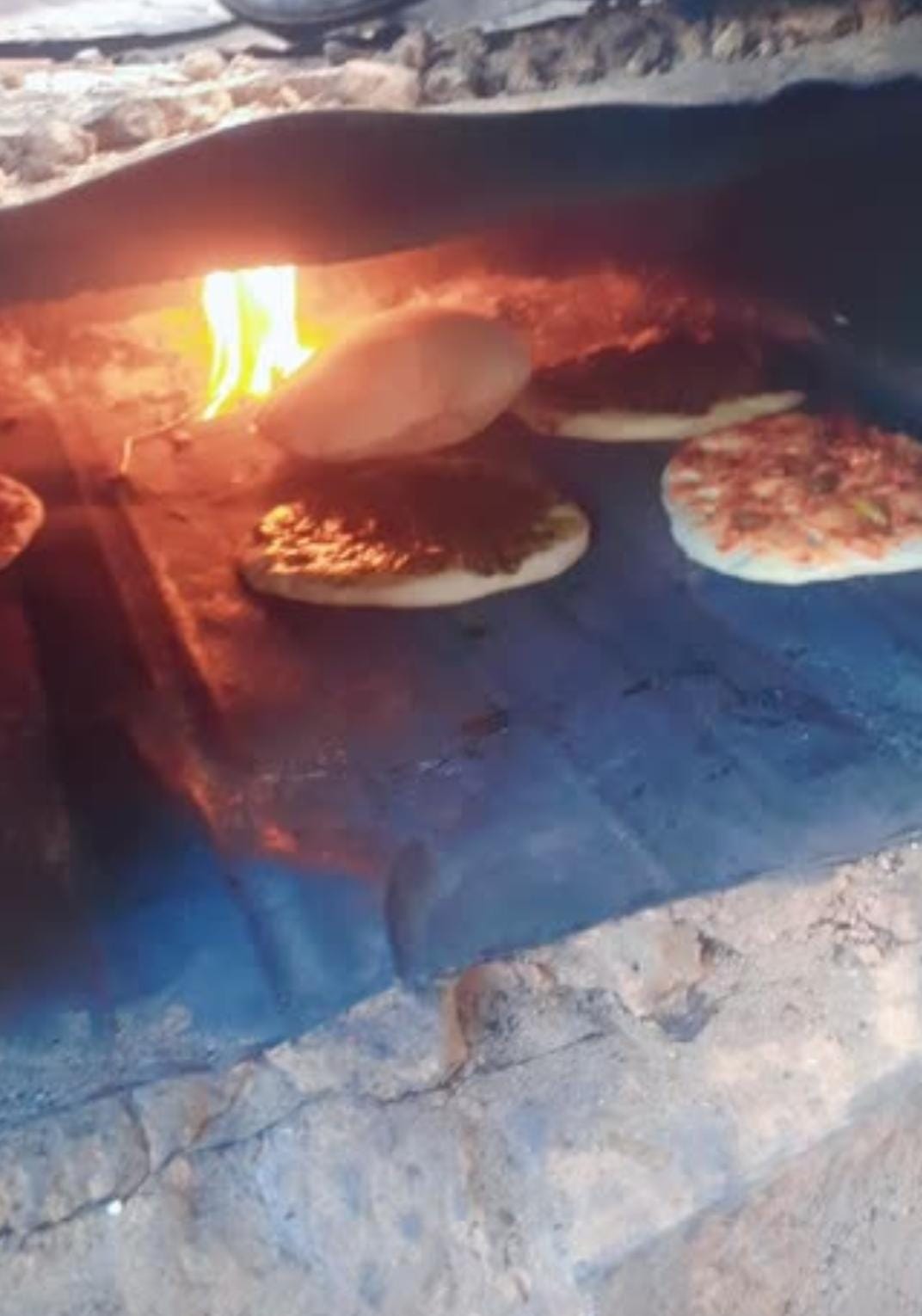 Baking bread with an open fire