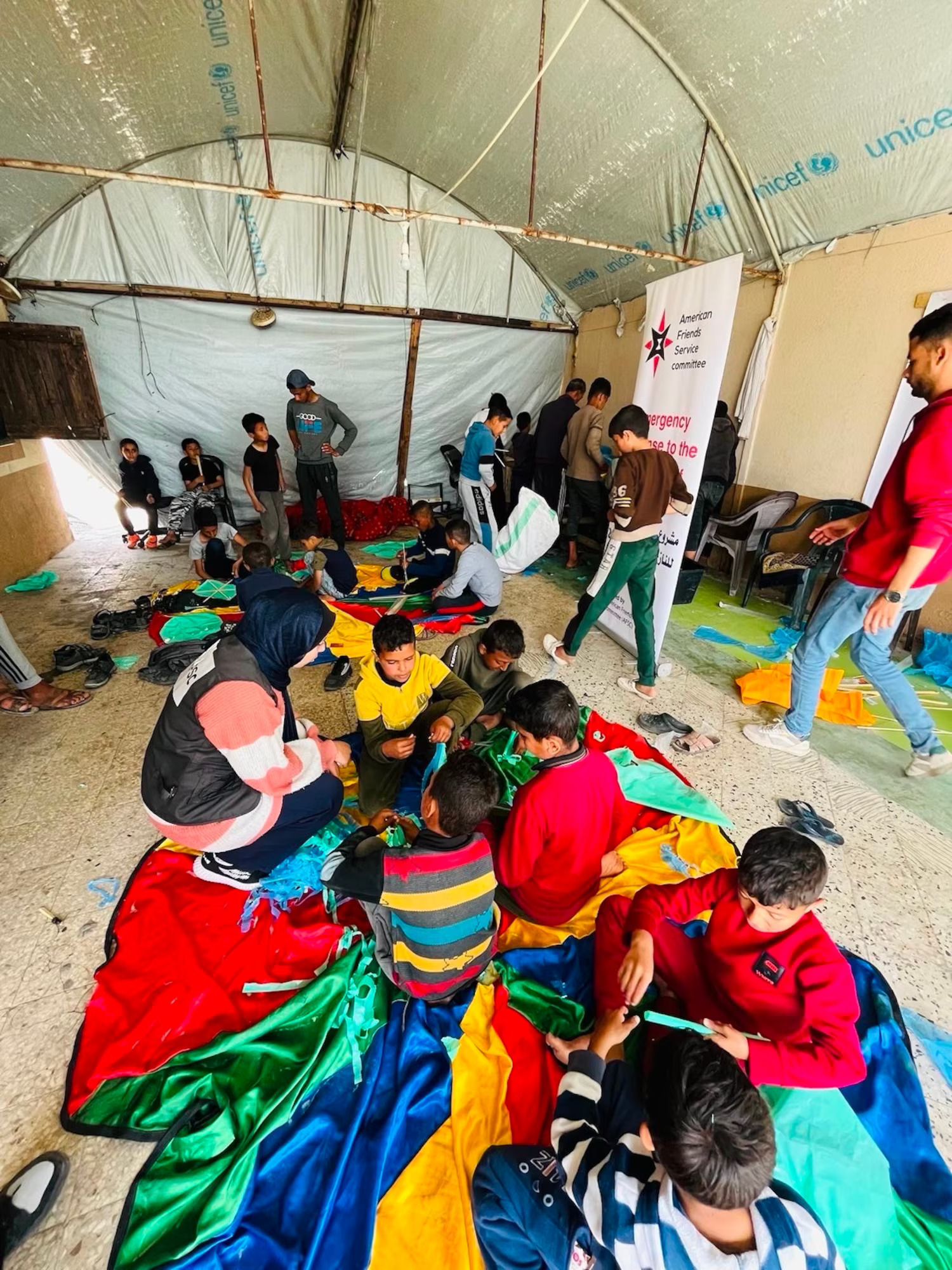 Children making kites at a festival in Rafah